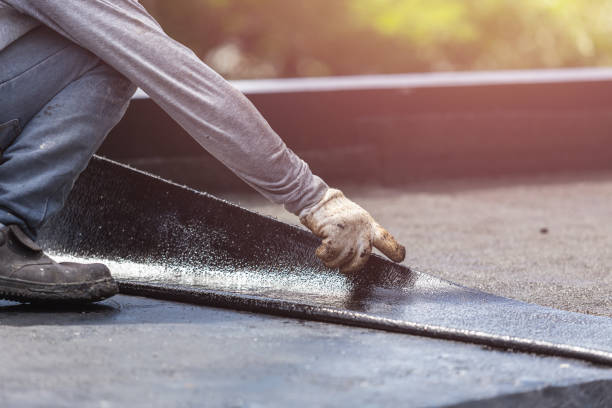 Professional Waterproofing technician working in Burlington, OH